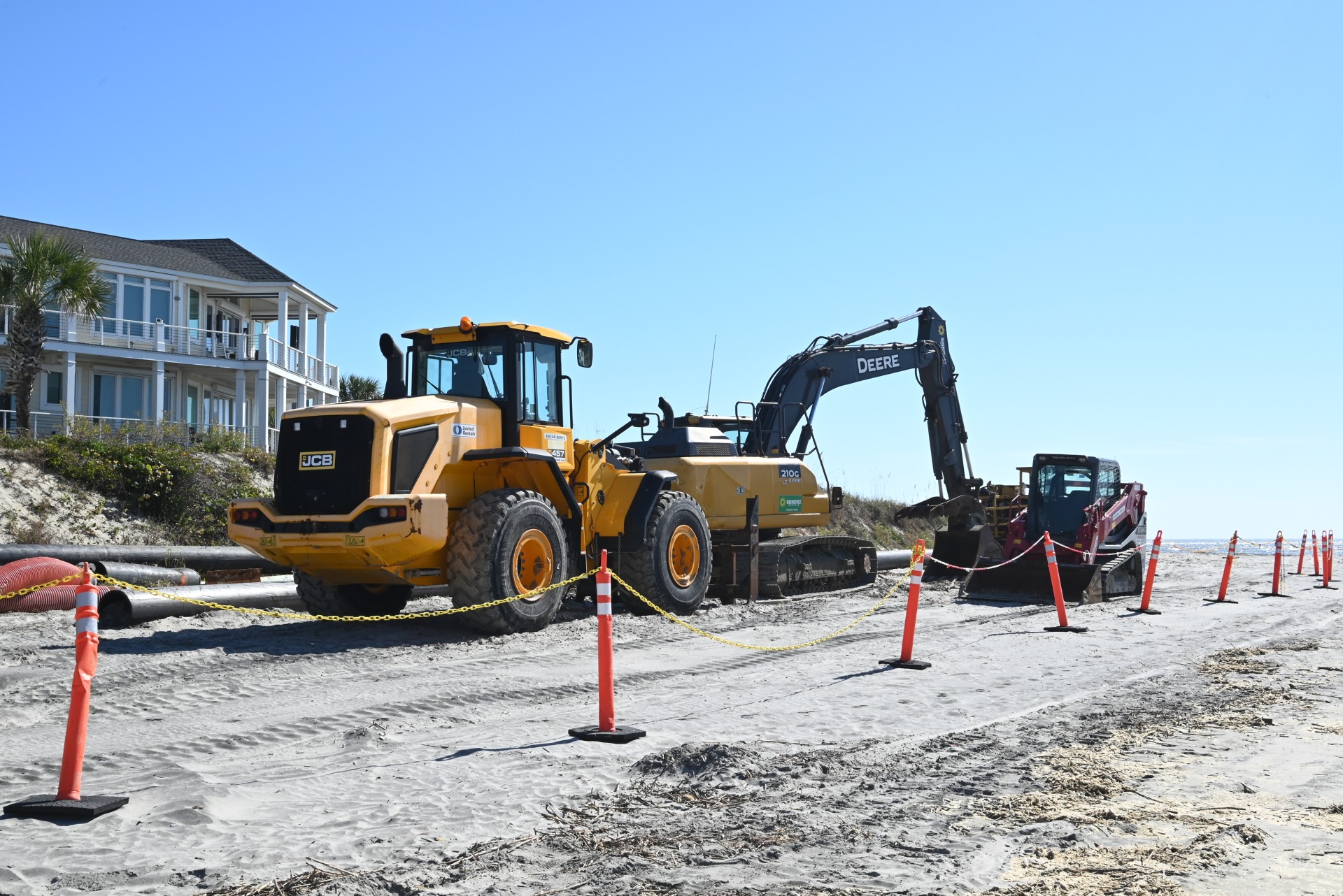 Sand erosion keeps 2 beach towns busy